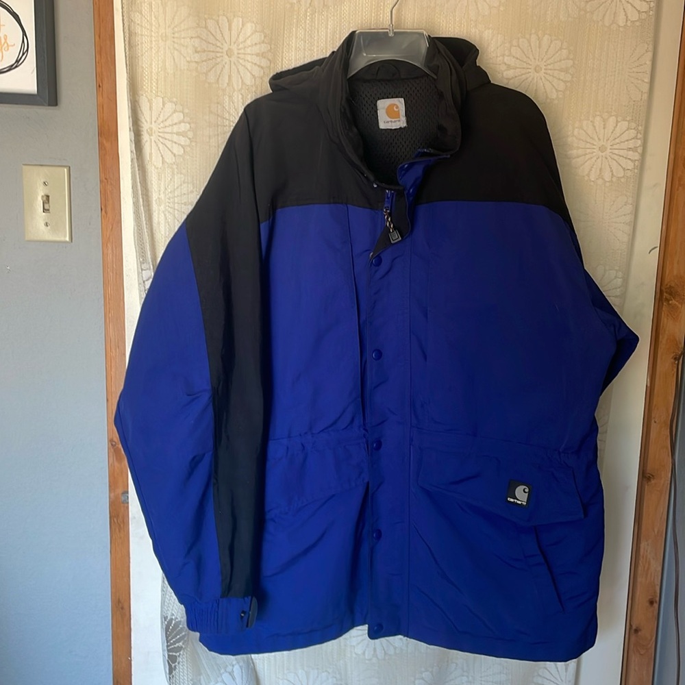 Carhartt Men's Black and Blue Performance parka.